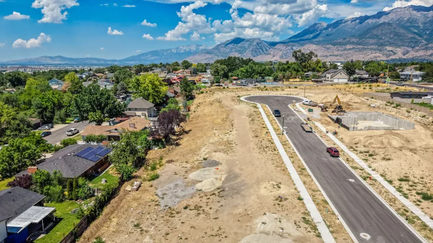 Newly paved street with concrete sidewalks