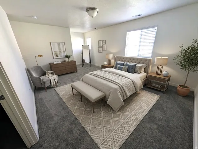Recessed window with blinds, ceiling-mounted light fixture, and wall-to-wall carpeting