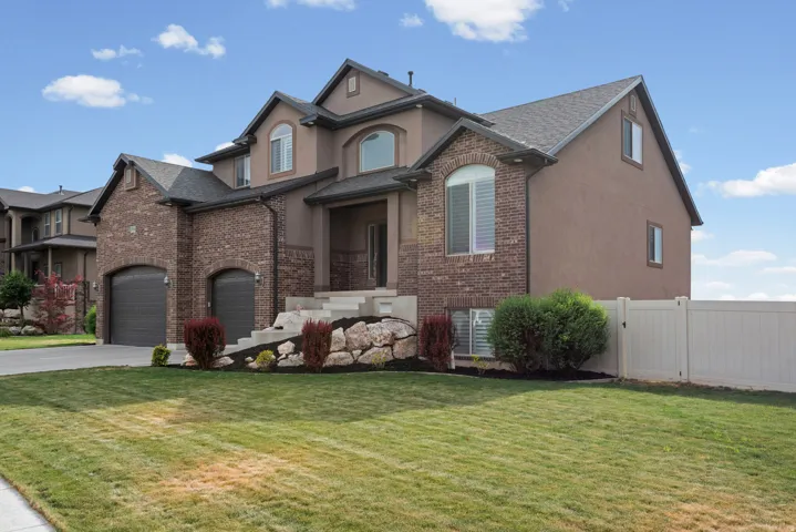 Stucco and brick exterior with arched windows