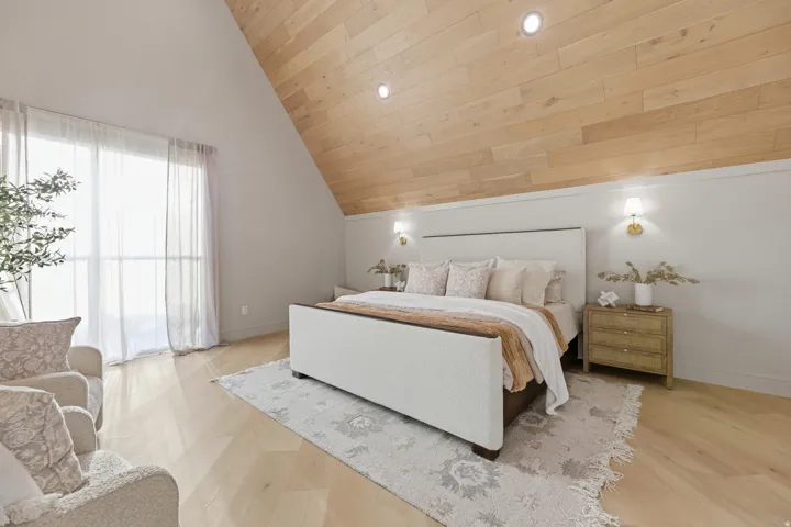 Vaulted wood-finish ceiling, recessed lighting, wood-finish flooring, and large windows