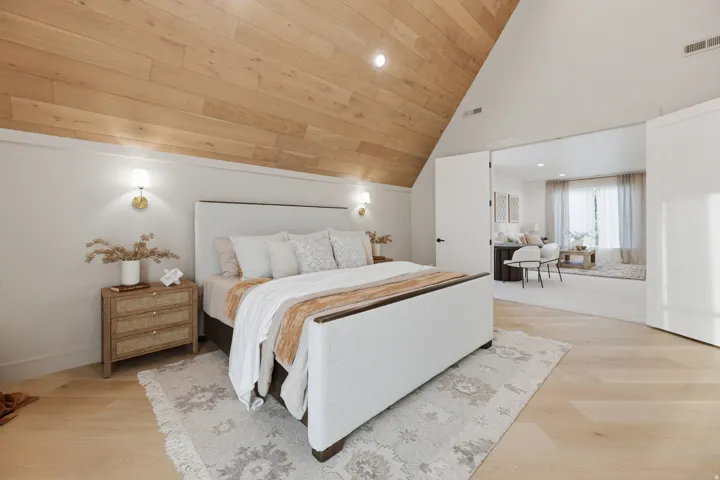 Angled wood-finish ceiling with recessed lighting