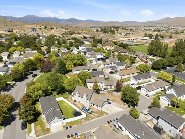 Expansive neighborhood with diverse residential architecture and mature landscaping