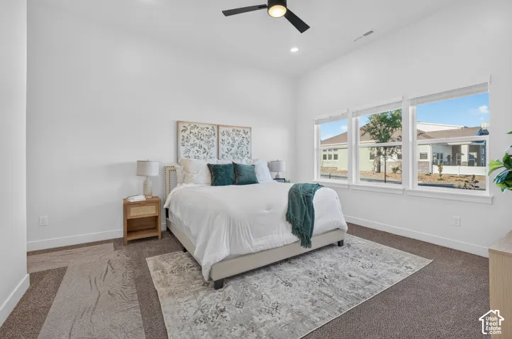 Primary bedroom with private en' suite and walk in closet