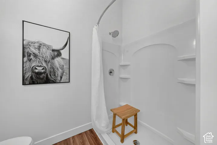 Primary Bathroom with double vanity and walk in shower