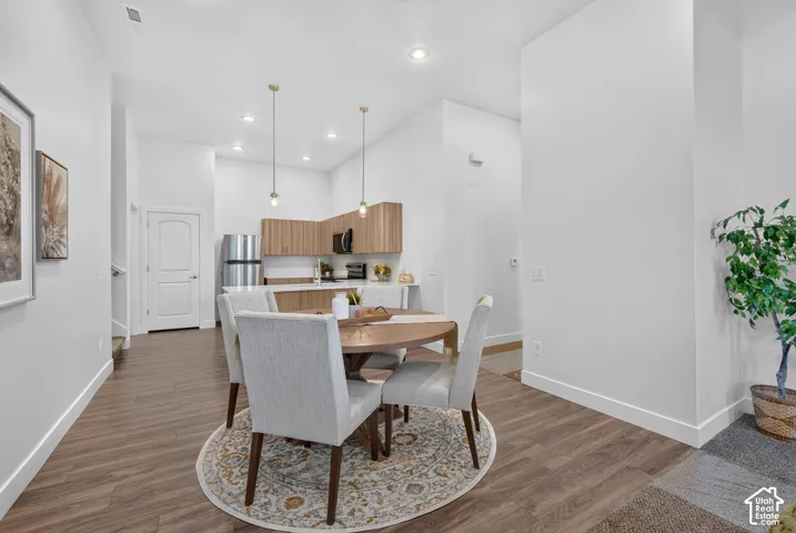 Dining area opens to kitchen and living room.