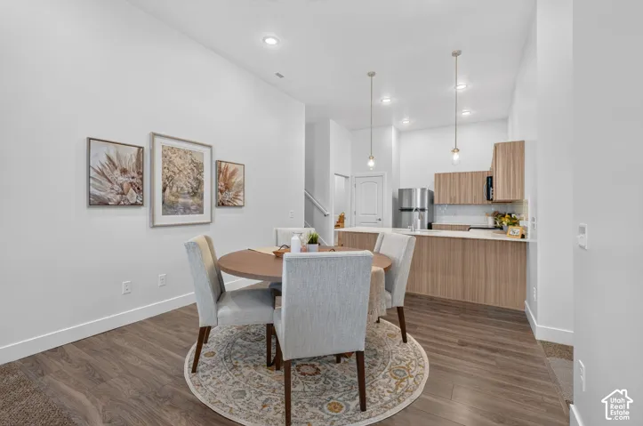 Dining area opens to kitchen and living room.