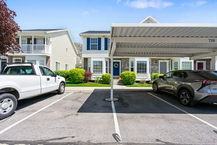 Carport parking with numbered spaces