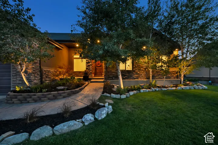 Stone veneer exterior with stucco accents