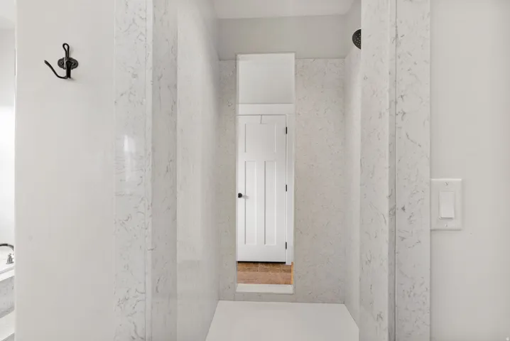 Walkthrough shower. Primary bedroom