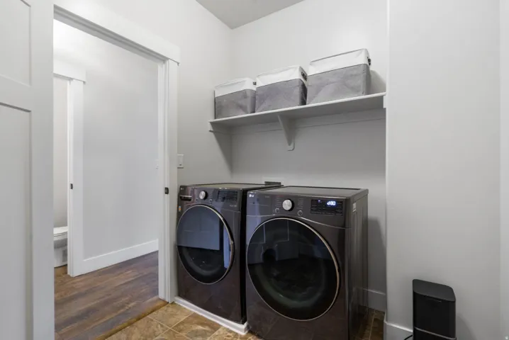 Utility space featuring built-in shelving
