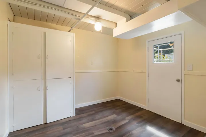 Wood-finish flooring with floor drain