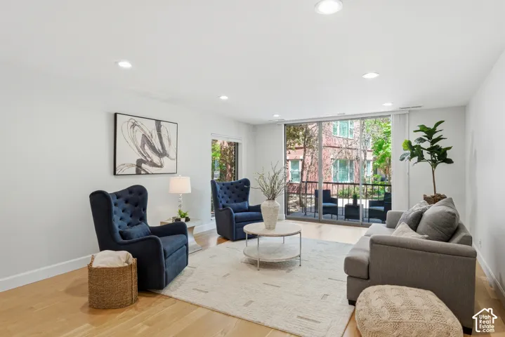 Light wood-finish flooring with recessed lighting