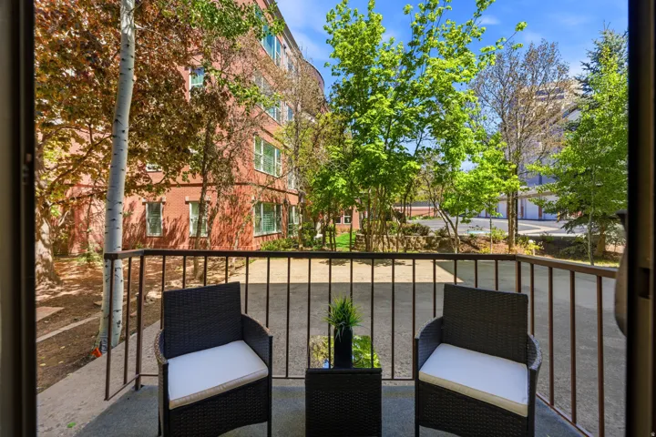 Private balcony with dark metal railing