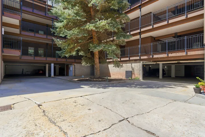 Multi-story building with concrete exterior and dark metal railings