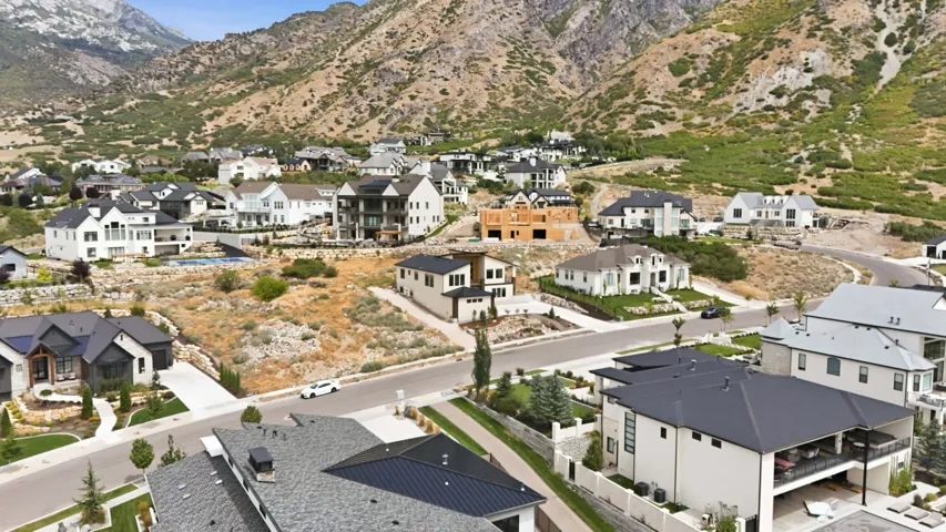 Mountainous terrain backdrop with residential properties