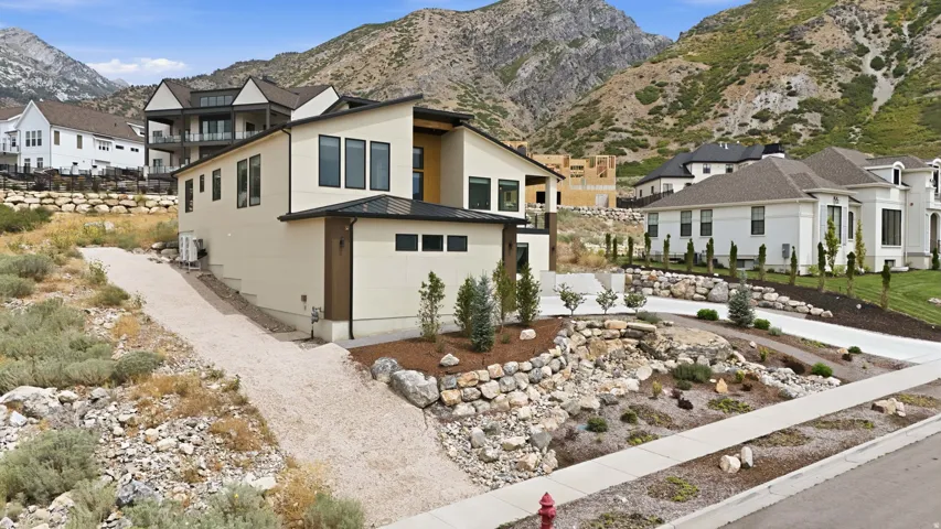 Contemporary architecture featuring a multi-level design and large windows