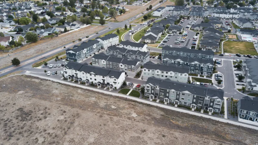 Residential area featuring multi-story townhomes and single-family residences