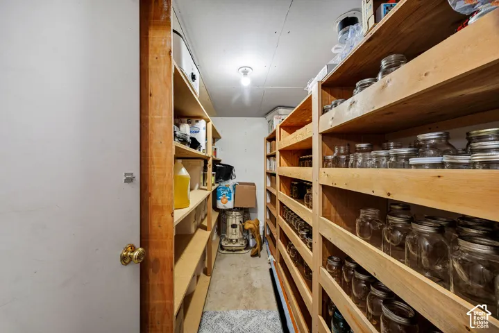 Built-in wood shelving storage room.