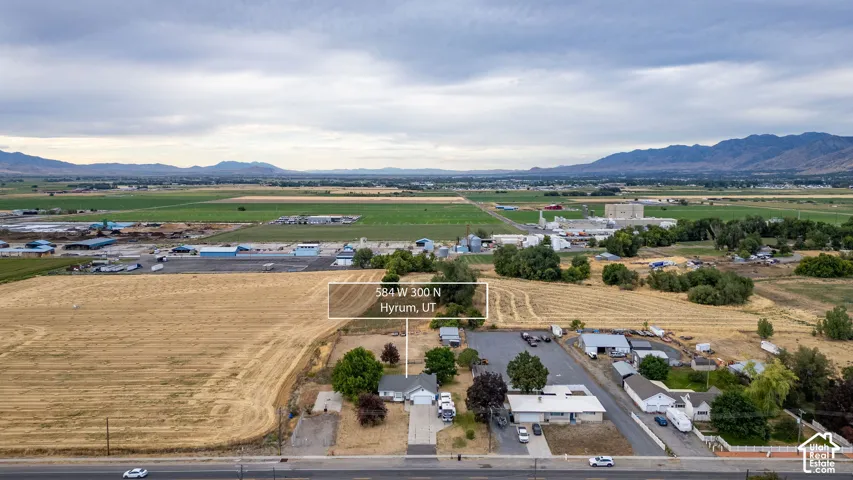 Aerial view of residence with pinned location marker.