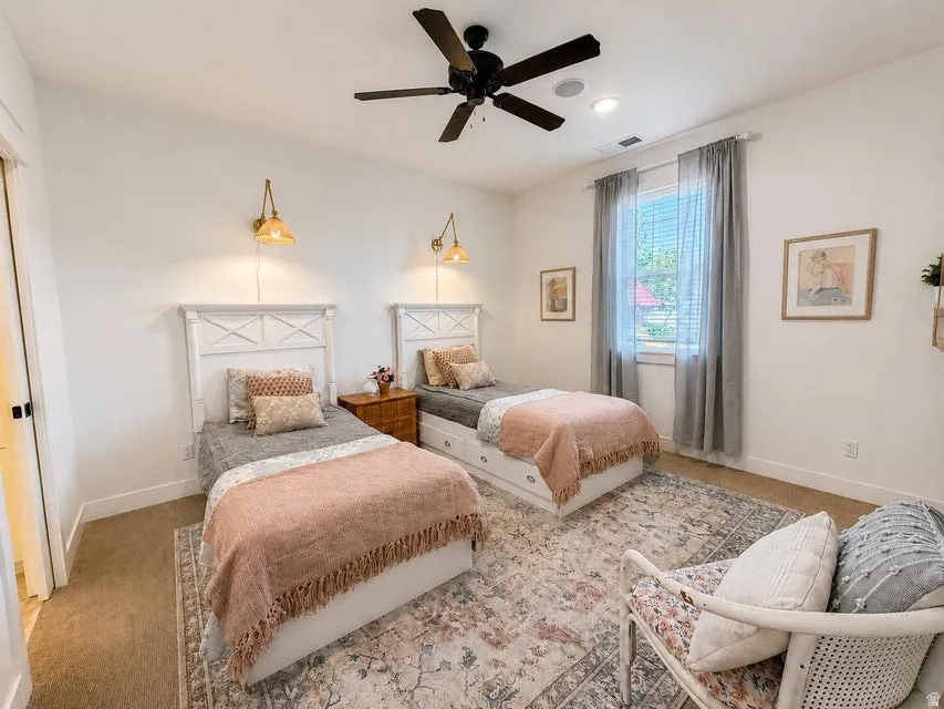 Carpeted flooring, recessed lighting, and a ceiling fan