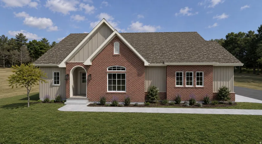 Brick and vertical siding exterior with an arched entry
