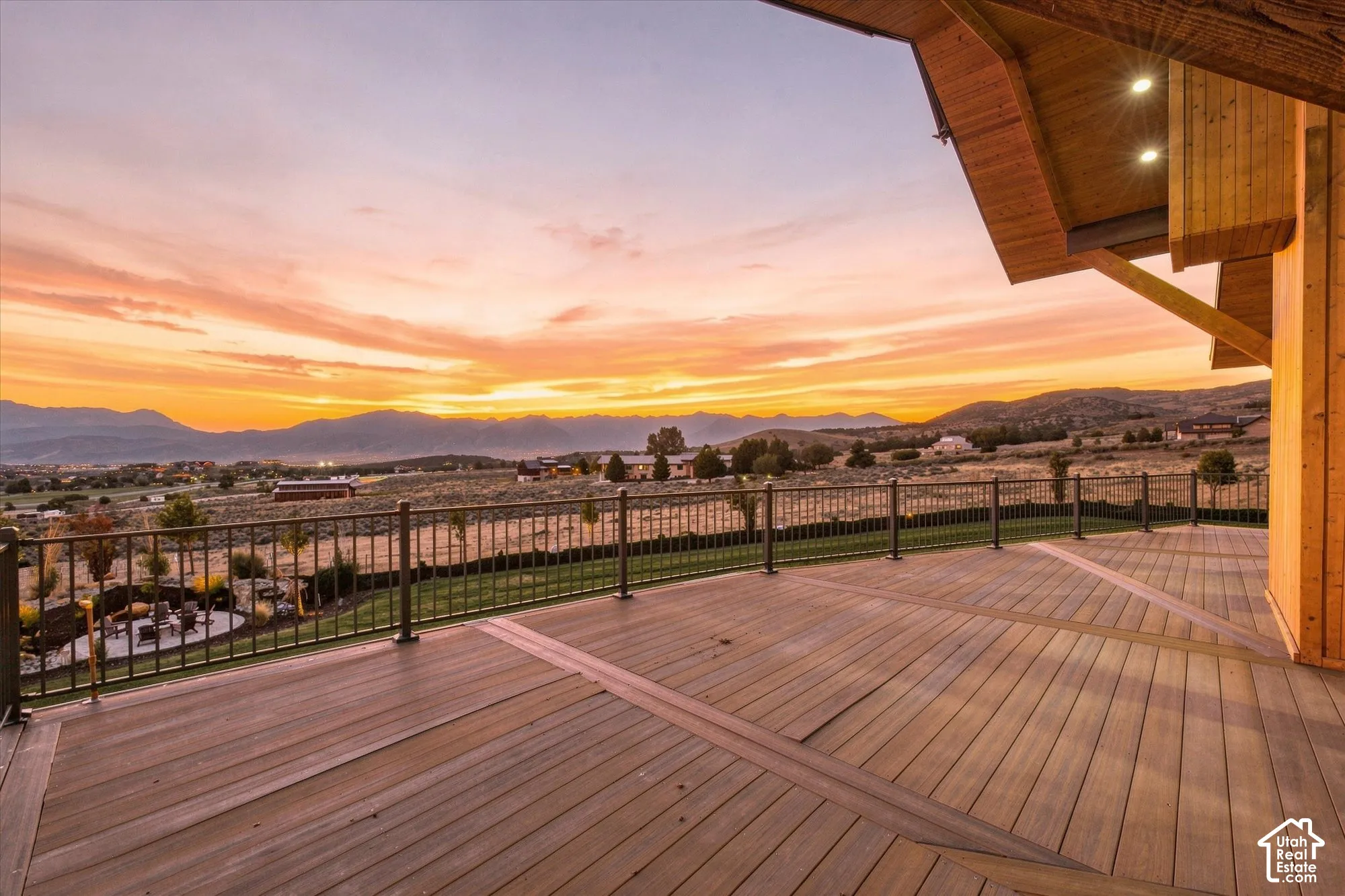 Expansive outdoor deck with composite decking and decorative railing