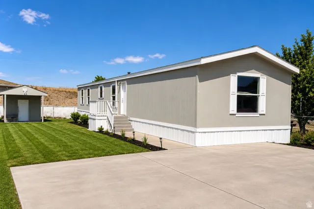 Light gray exterior siding with white trim