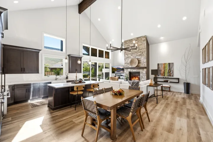 Kitchen with dark wood cabinetry, white countertops, and a central island