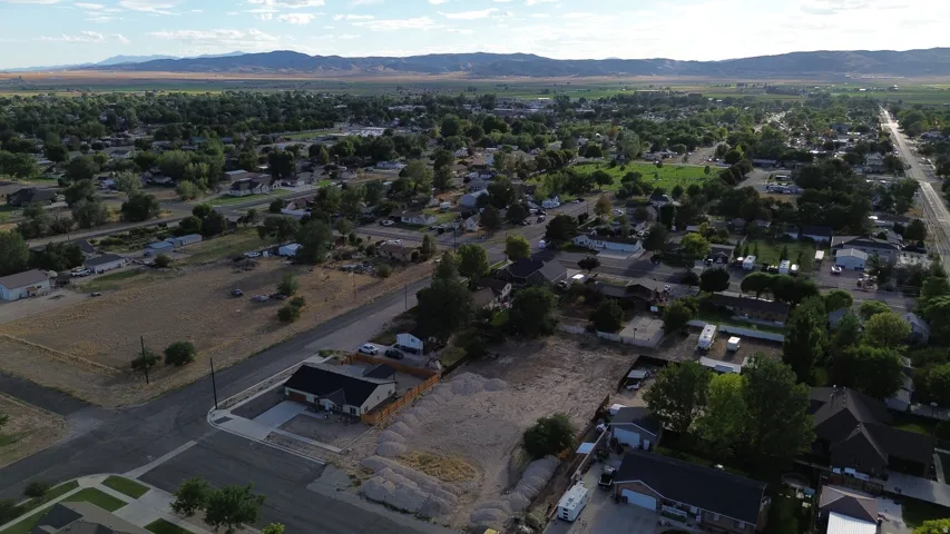 Ariel view of raw land and view of Nephi City