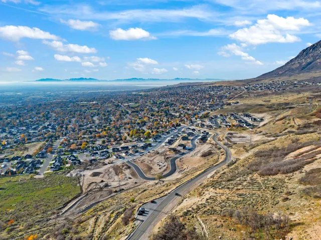 Expansive mountain landscape with a developed residential area