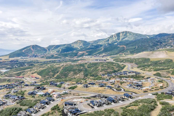 Rolling hills with scattered residential structures