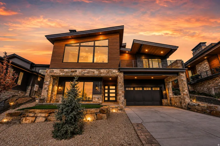 Modern architectural design with stone and wood-look siding