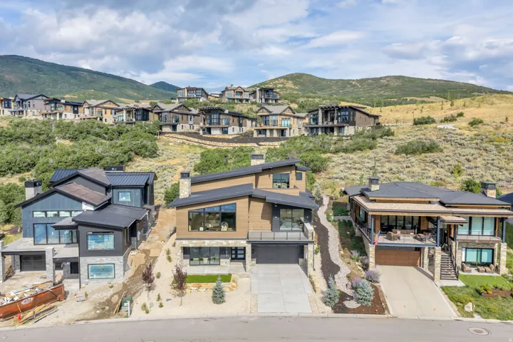 Modern architectural design with multiple balconies and large windows