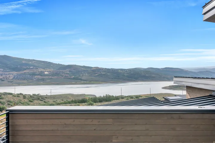 Lake and mountain scenery with modern architectural elements