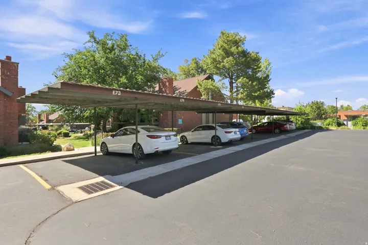 Covered parking structure with designated spaces