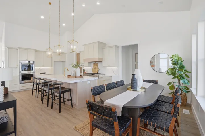 Vaulted ceiling and recessed lighting complement the open-concept design
