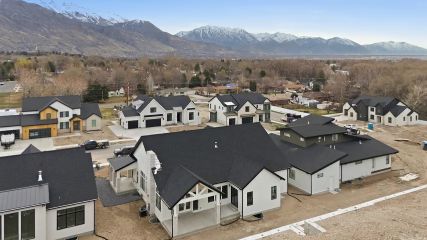Modern new construction community with mountain backdrop