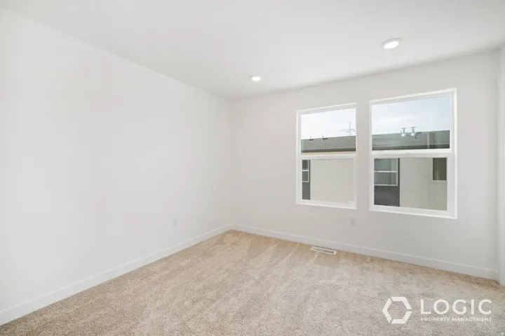 Neutral-toned carpeting throughout