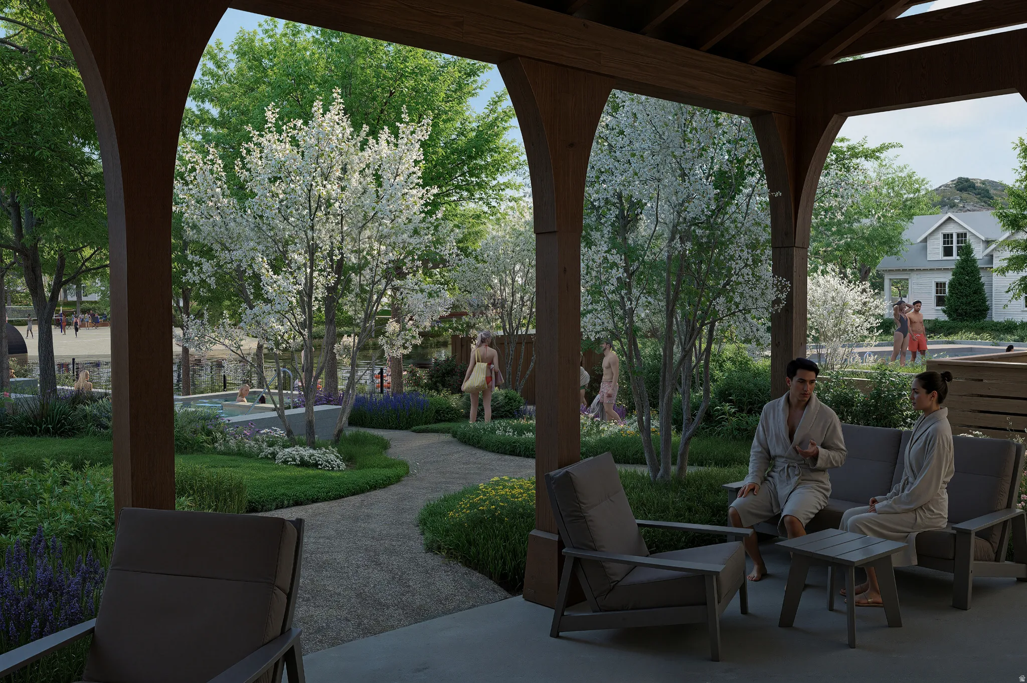 Covered outdoor seating area with exposed wood beams, concrete flooring, and lush landscaping