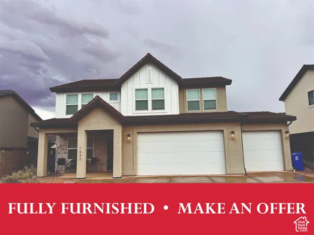 Two-story home featuring a clean stucco exterior with mixed neutral tones, gabled roofline with dark asphalt shingles, and a two-car garage with white sectional doors