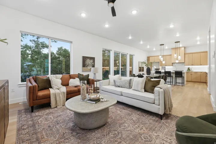 Recessed lighting, wood-finish flooring, and expansive windows