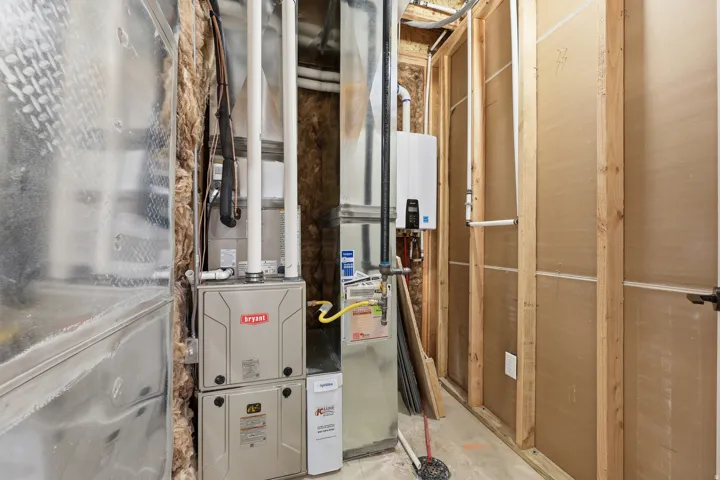 HVAC system with a tankless water heater