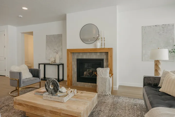 Fireplace with wood surround and tile facade