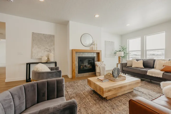 Recessed lighting, wood-finish flooring, and multiple windows