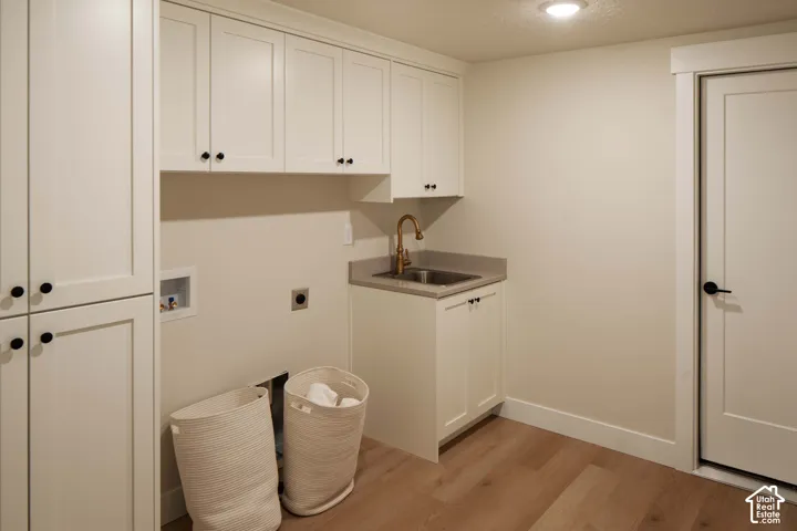 White shaker cabinetry with black hardware