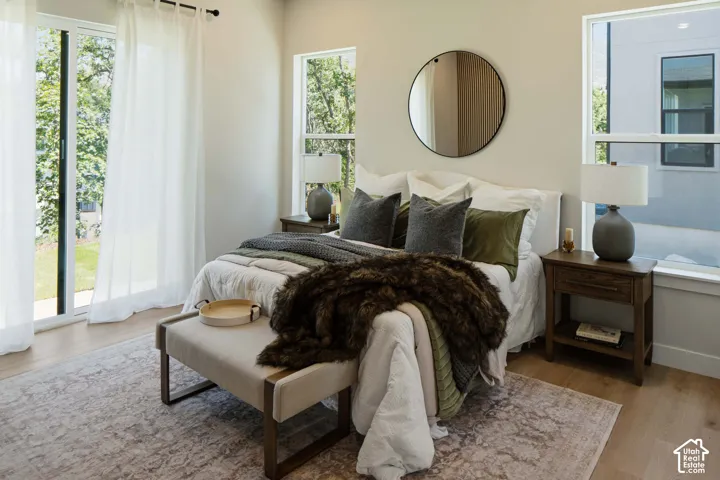 Light wood-finish flooring with a neutral wall color
