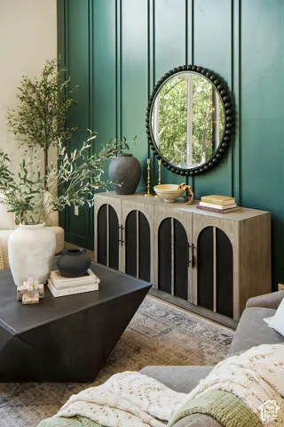 Green accent wall with vertical paneling