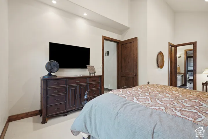 Recessed lighting, wood-finish doors, and high ceilings
