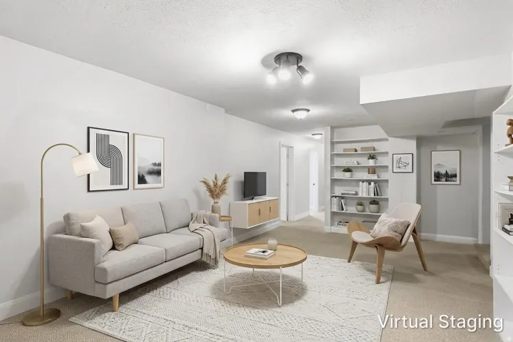 Recessed lighting, built-in shelving, track lighting, and neutral wall paint