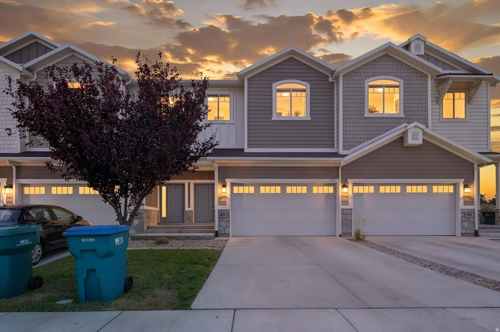 Multi-story exterior with a combination of horizontal siding and shingle accents